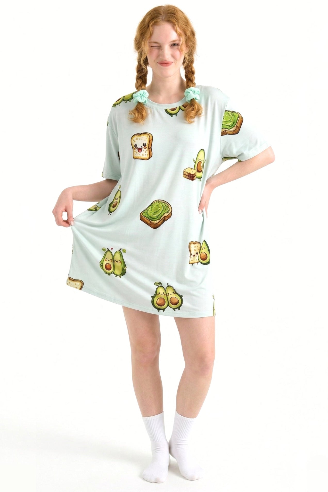Woman wearing the Avo-Good Night oversized mint avocado toast print sleep tee with matching scrunchies