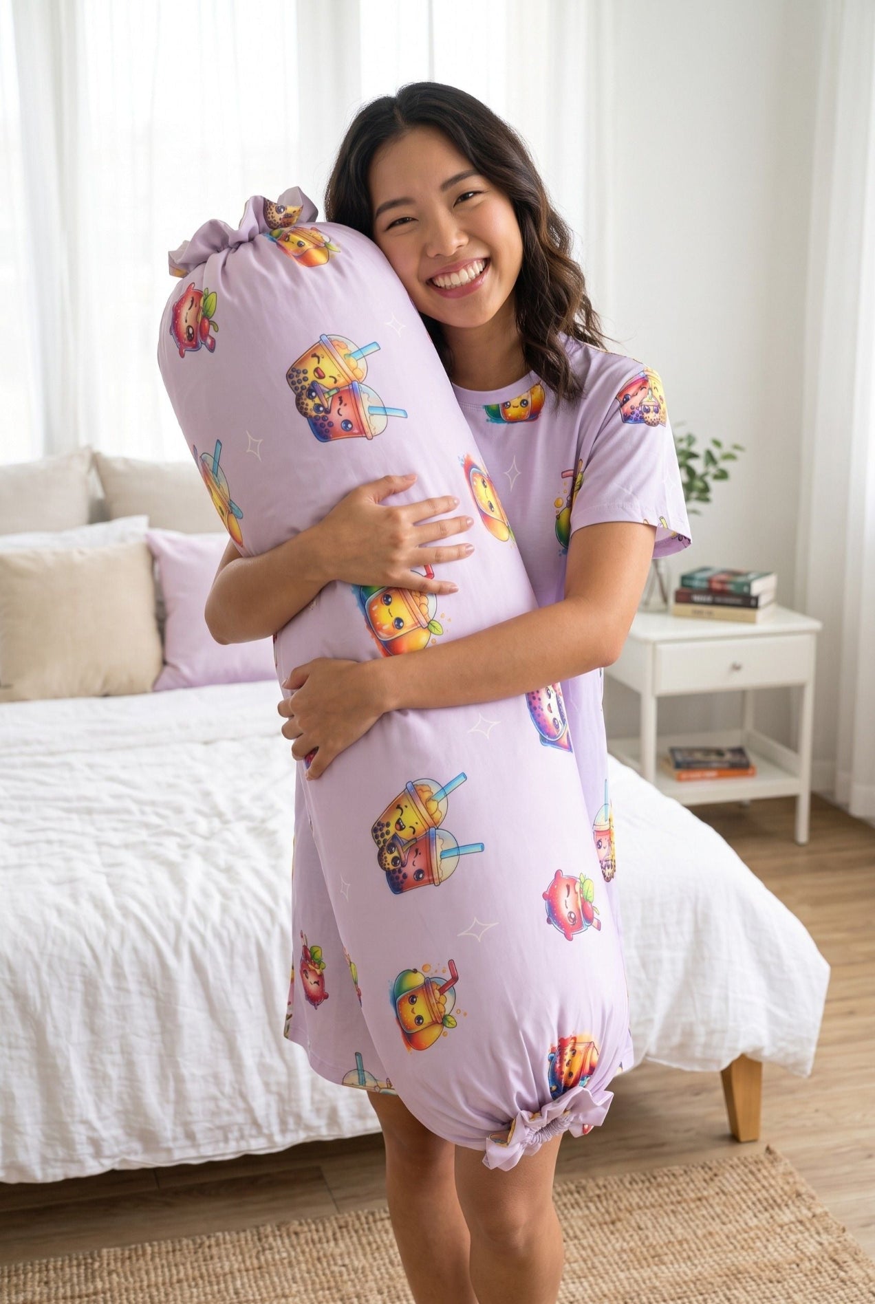 Woman in The Bubble Tee lilac bubble tea print sleep tee hugging a matching bamboo bolster