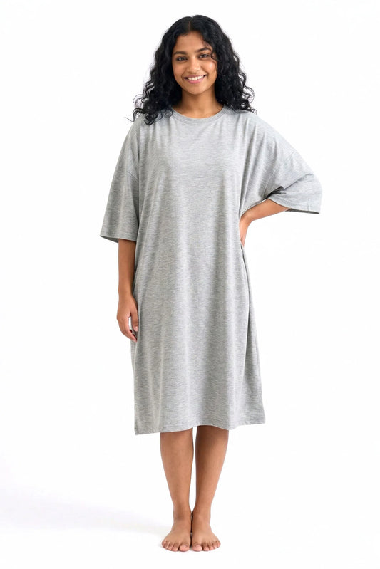 Woman wearing a gray bamboo sleep tee from MySleepTee on a white background