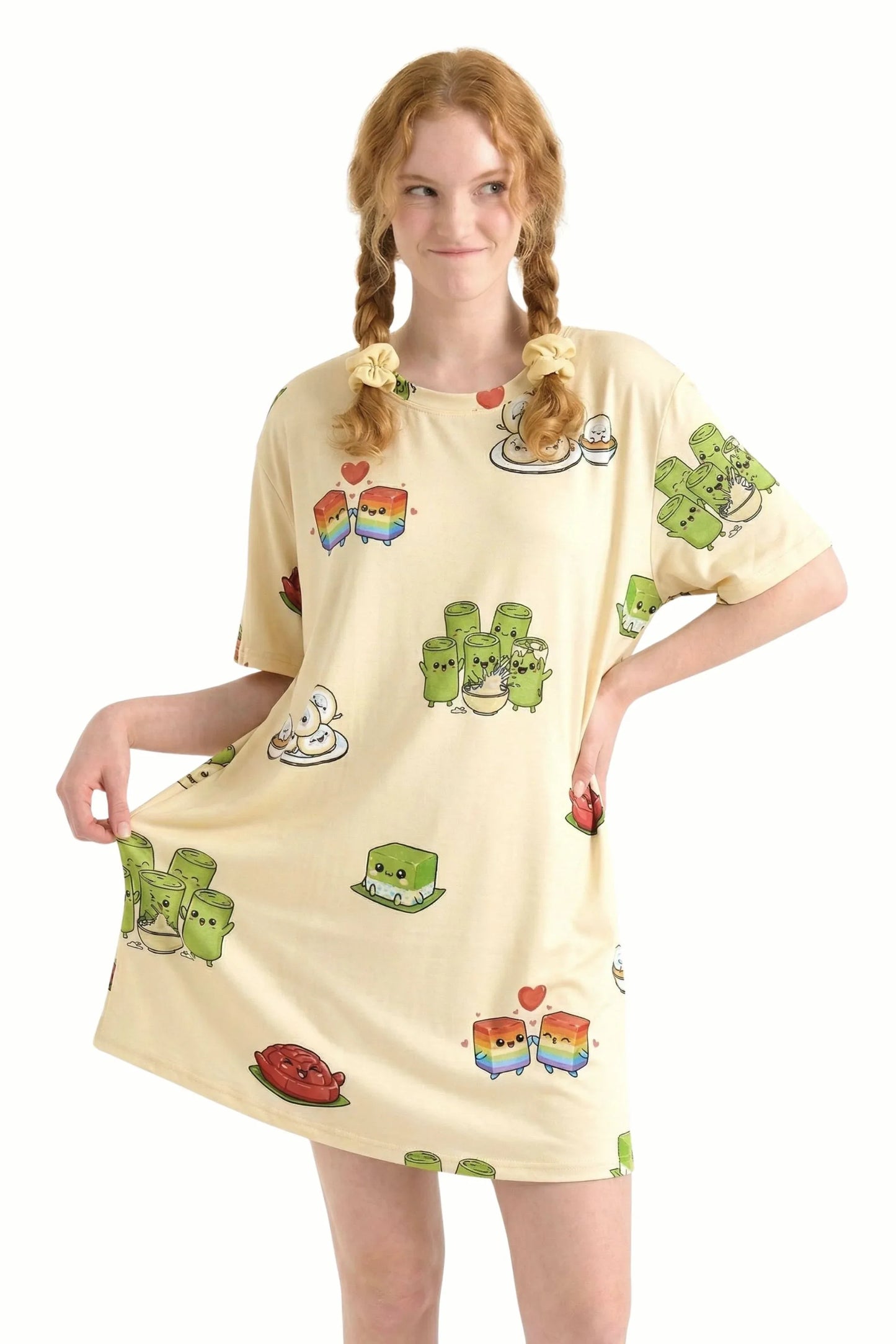 Woman showing fabric drape and stretch of Kueh-zy Medley petite bamboo sleep tee with kueh print