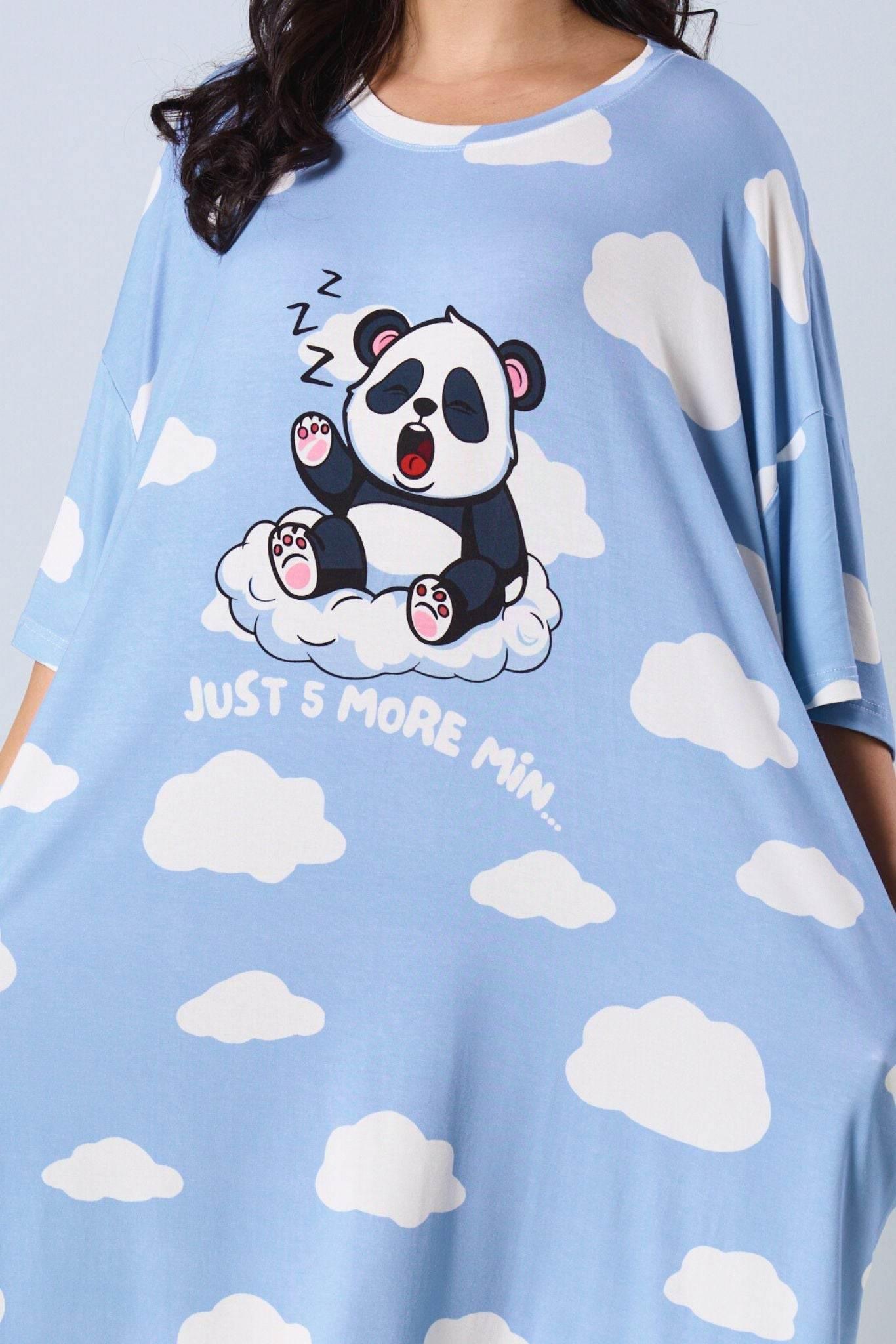 Light blue sleep tee with panda and cloud patterns on a plain background