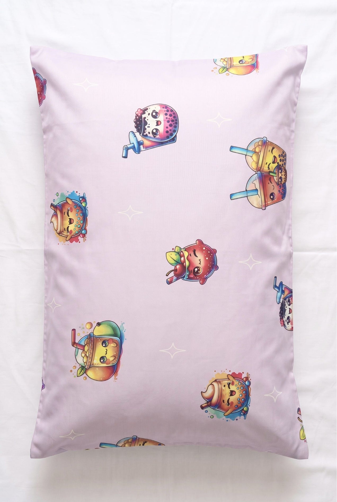 The Bubble Tee bamboo pillowcase in lilac bubble tea print, flat lay on white