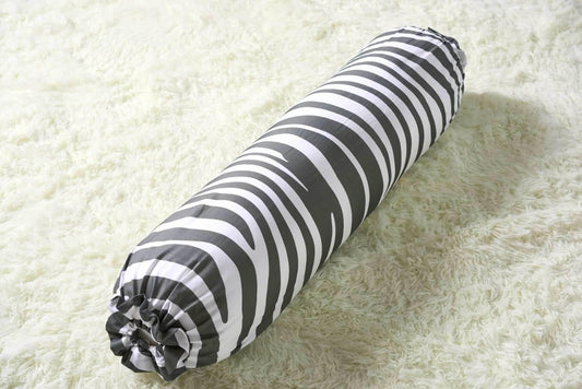 Black and white zebra striped bolster 