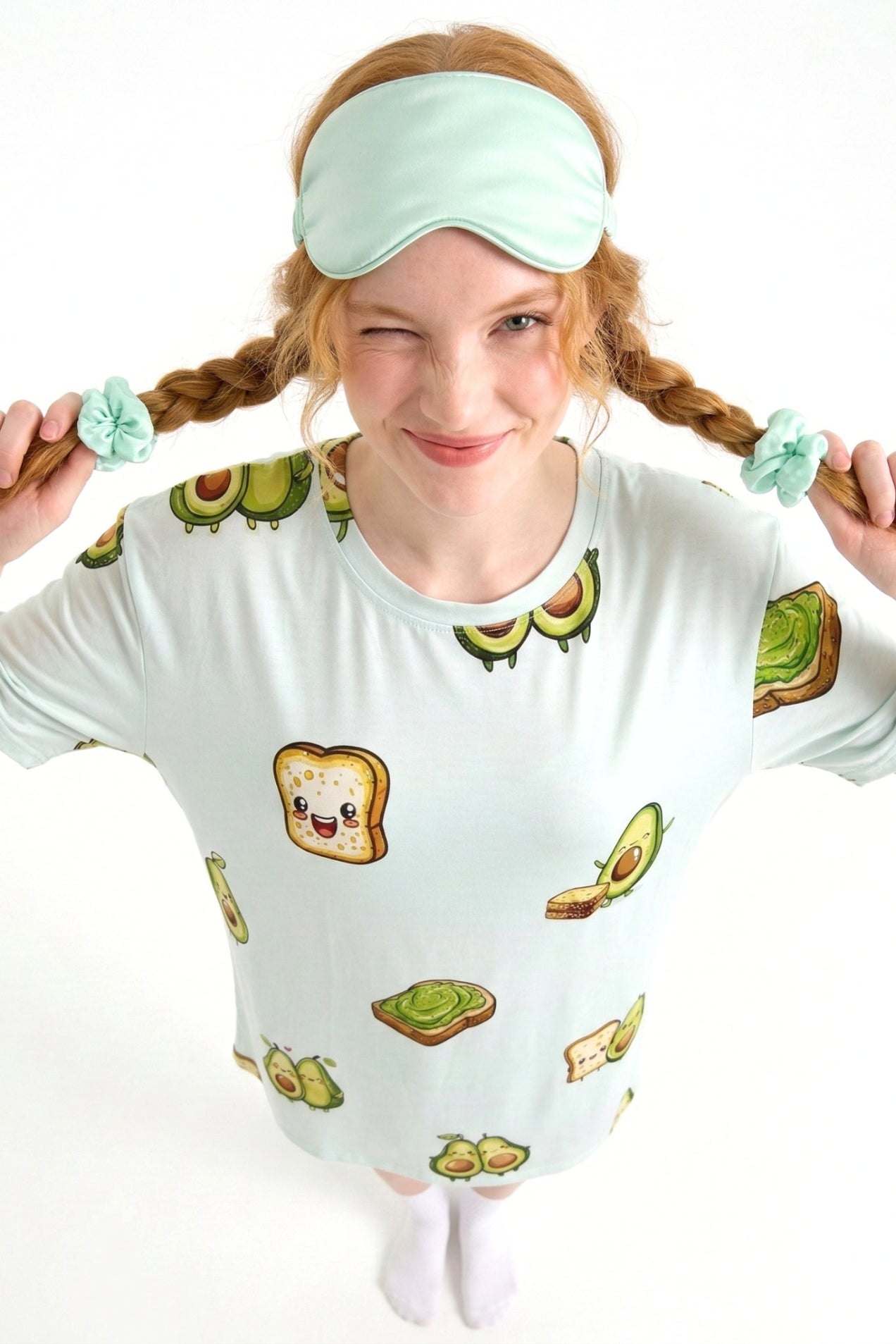 Woman in Avo-Good Night avocado toast print sleep tee with matching mint sleep mask and scrunchies