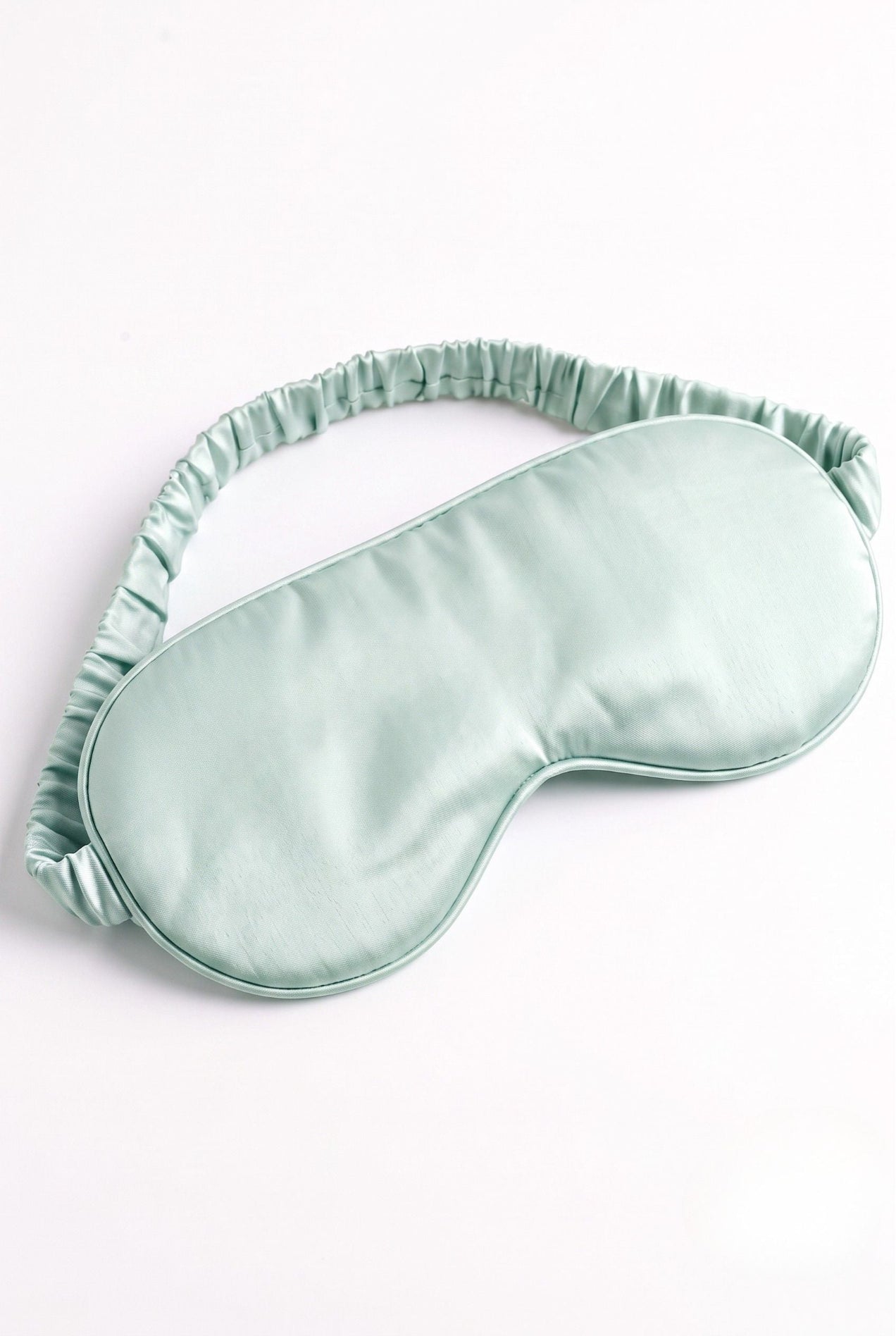 Avo-Good Night sleep mask in solid mint with elastic band, flat lay on white