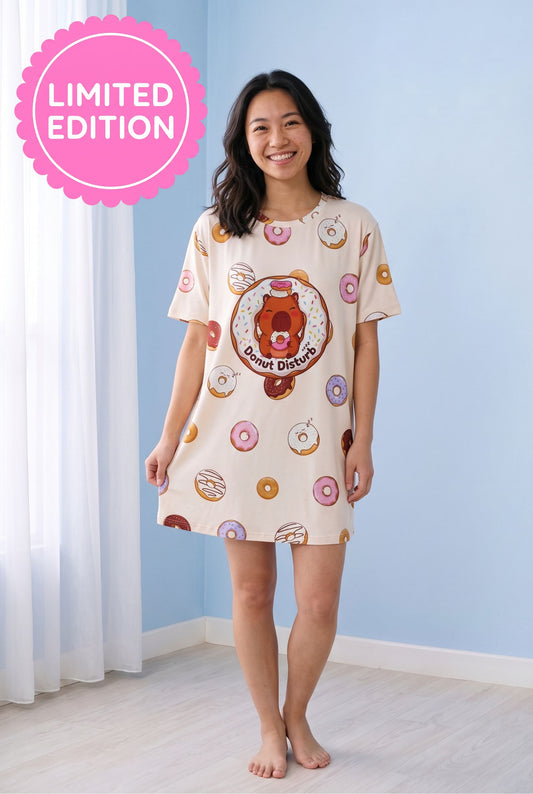 Front view of the Donut Disturb Petite bamboo sleep tee, a shorter sleeker cut falling mid-thigh on a 160cm model.