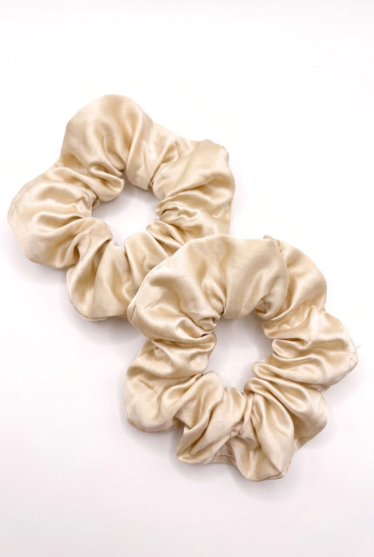 Kueh-zy Medley scrunchie set of 2 in solid cream, flat lay on white