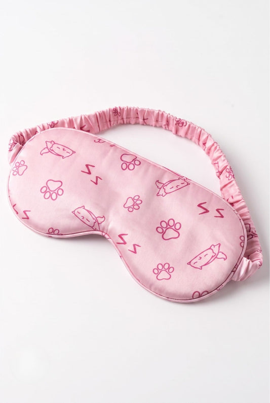 Paws & Snooze bamboo sleep mask in pink cat and paw print with elastic band, flat lay on white