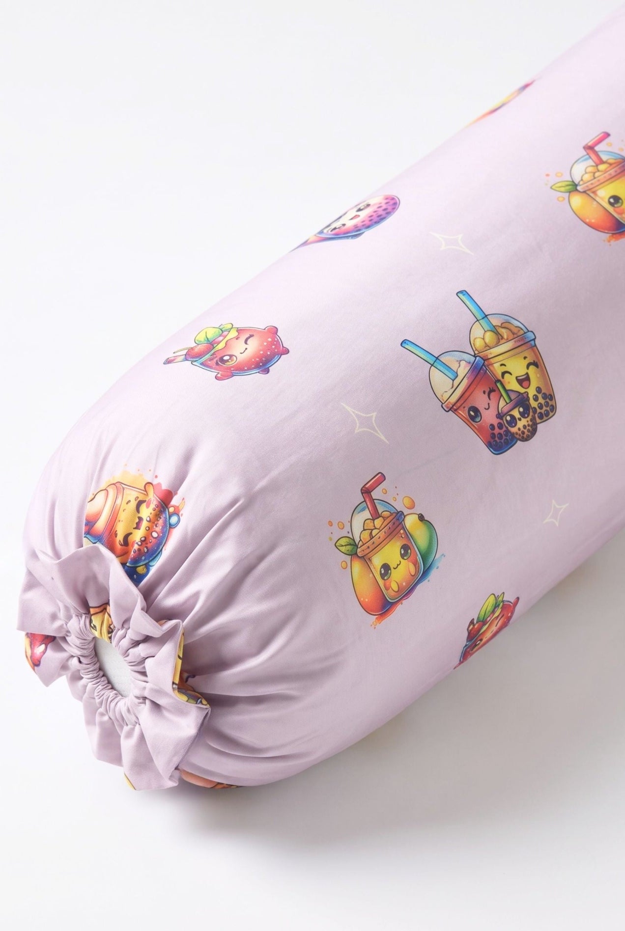 Close-up of The Bubble Tee bamboo bolster cover in lilac bubble tea print showing the tie-end detail