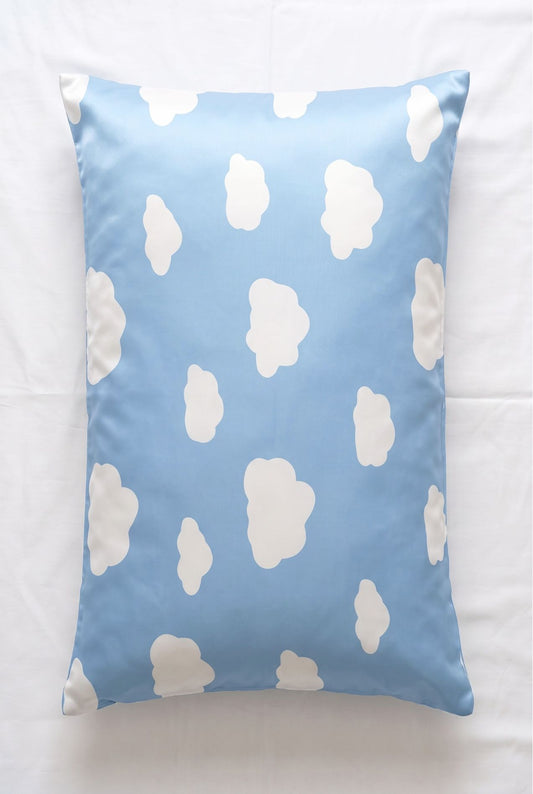 Un-bear-ably Sleepy bamboo pillowcase in blue cloud print, flat lay on white